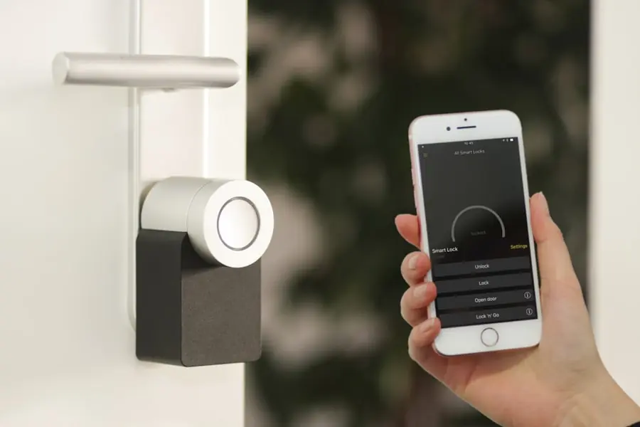 Security control panel and sensor on a wall